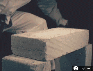Slow-Motion-Hand-Brick-Breaking.gif