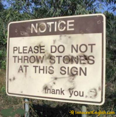 stupid_signs_throw_stones.jpg
